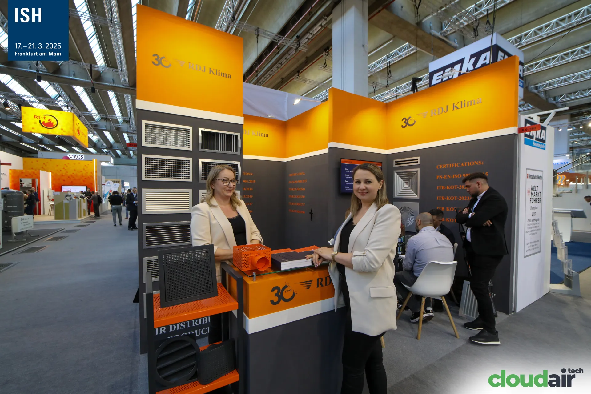 RDJ Klima team at the 30-years counter with grille display at ISH 2025
