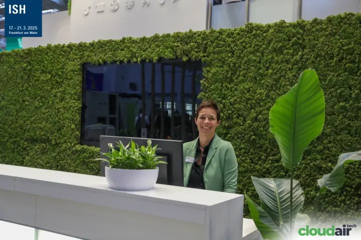 Reception desk in front of the Linear moss wall at ISH 2025