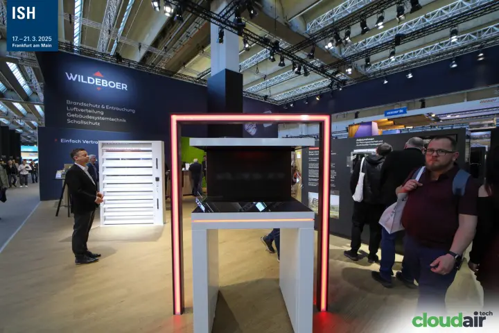 Red-lit display frame and EKM90 smoke damper on the Wildeboer stand at ISH 2025
