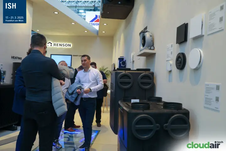 Renson stand with black heat recovery units and a glass floor duct display at ISH 2025