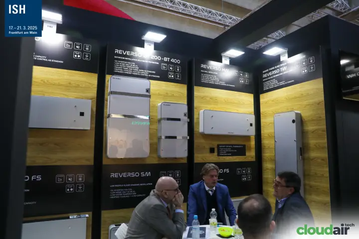 Reverso fan coil range on wood-effect panels with a meeting below
