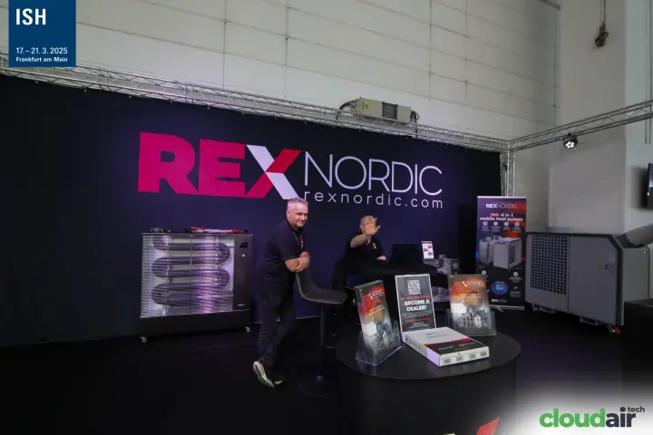 Rex Nordic staff with "Become a Dealer!" flyers and radiant heater