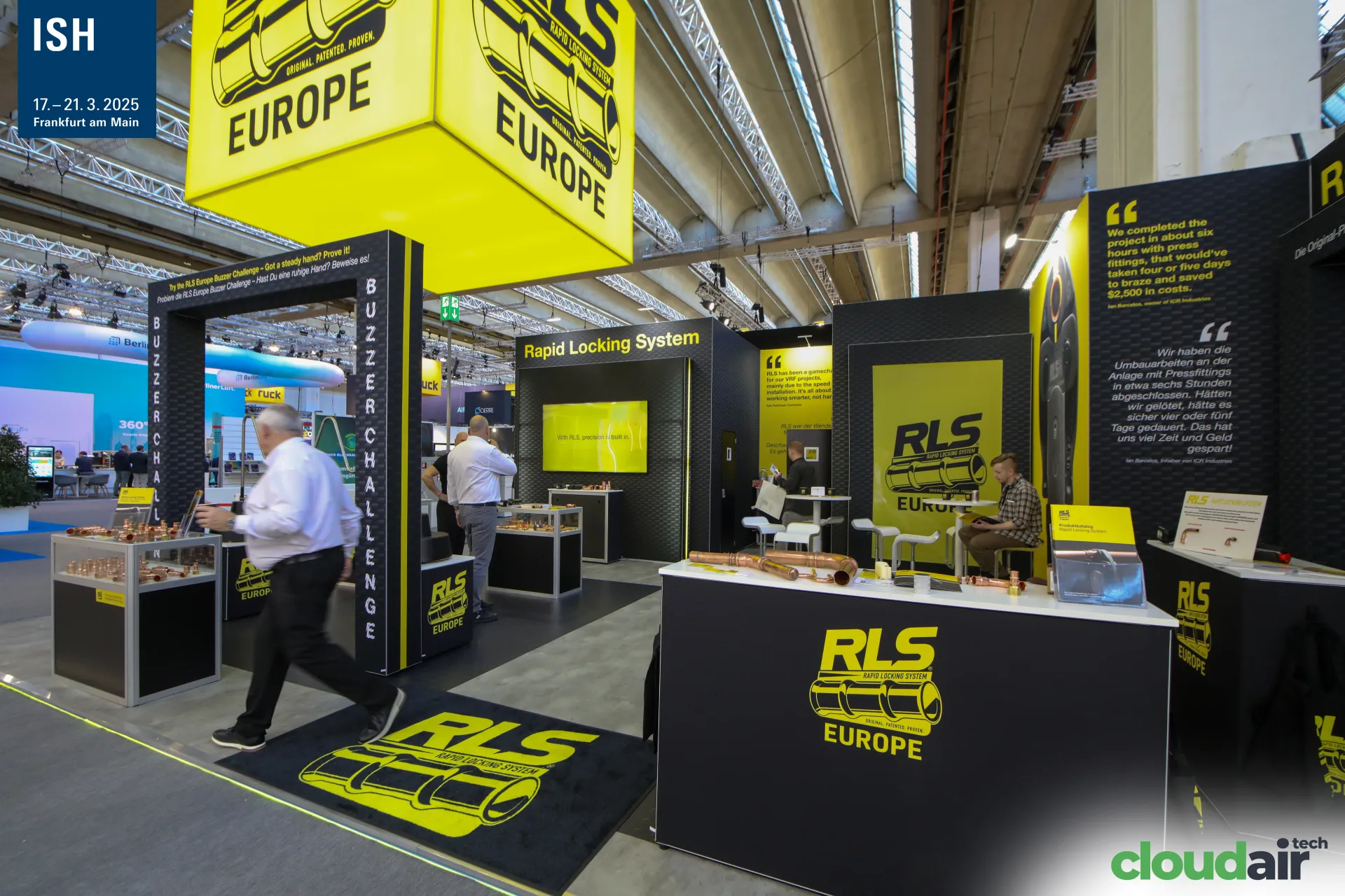RLS Europe counter with copper fittings and customer quote walls at ISH 2025