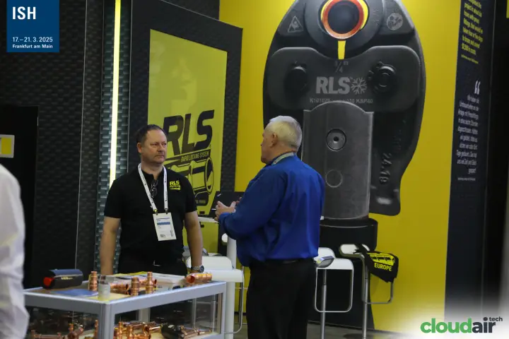 RLS stand with oversized press jaw graphic and copper fittings