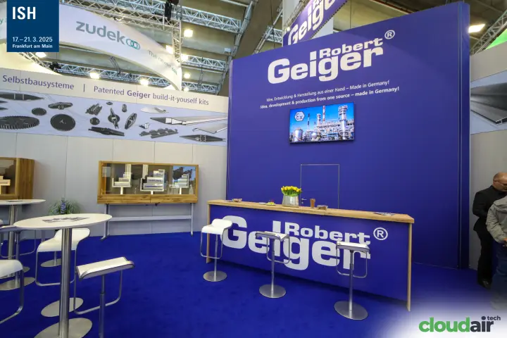 Robert Geiger bar counter and blue brand wall with Made in Germany slogan