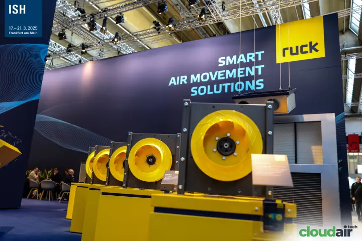 Row of yellow Ruck plug fans under "Smart Air Movement Solutions" at ISH 2025