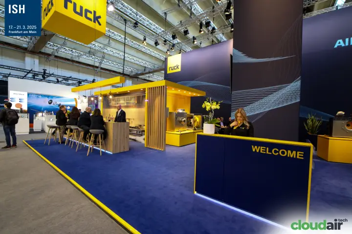 Ruck welcome desk and kitchen-style bar with extract hood at ISH 2025