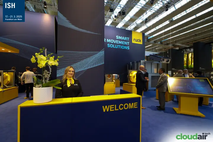 Ruck welcome desk with "Smart Air Movement Solutions" wall at ISH 2025
