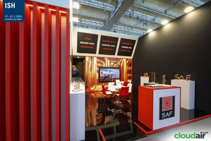SAF counter and copper letter sculpture beside red slatted wall at ISH 2025