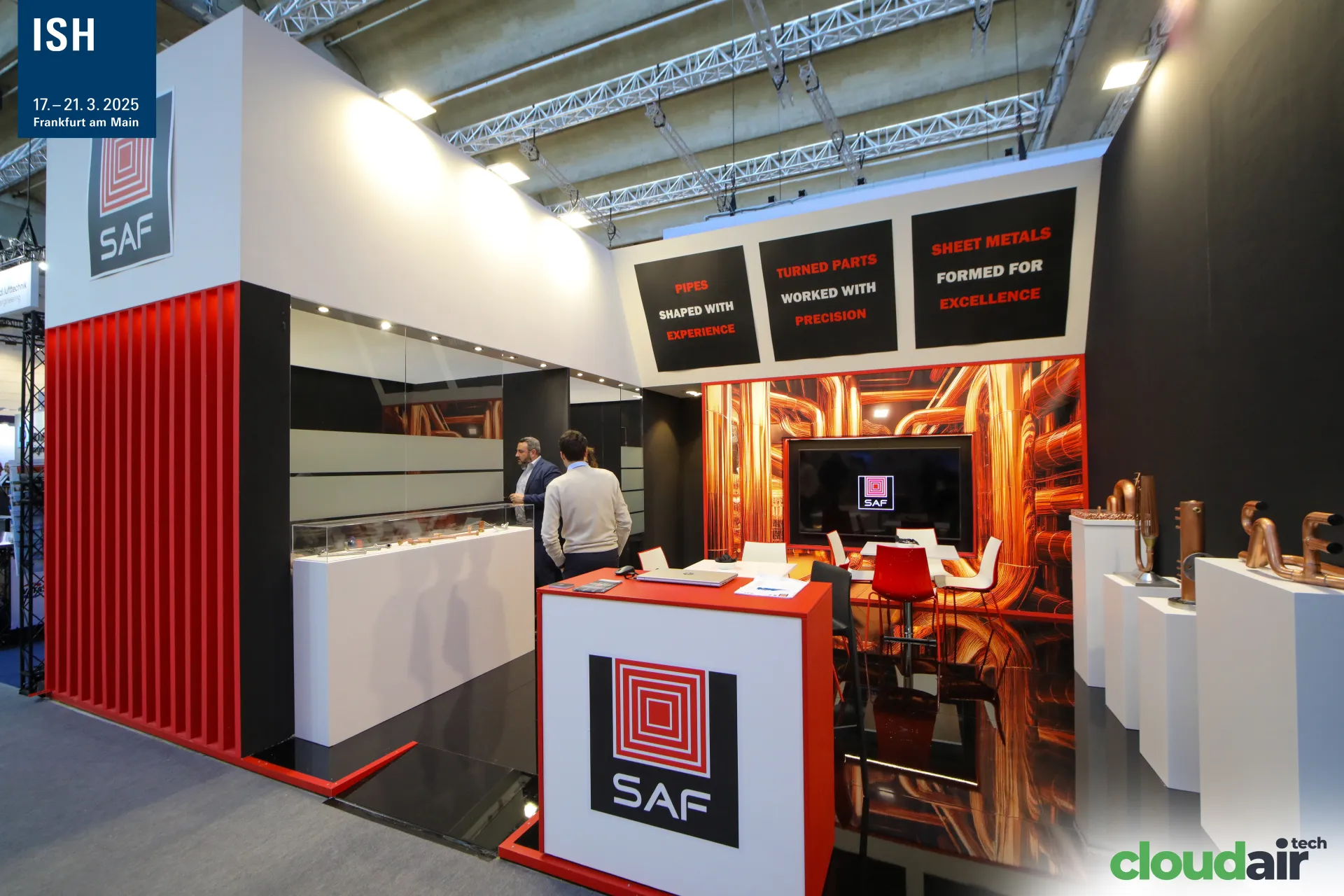 SAF stand with formed copper pipe parts and copper-themed back wall at ISH 2025
