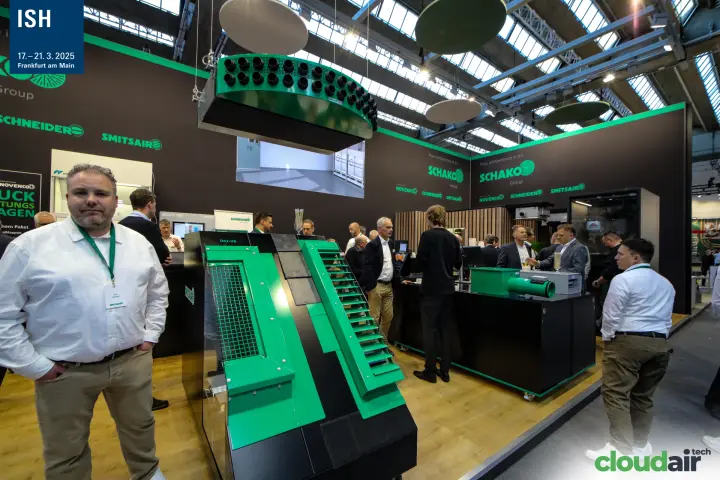 Schako stand with the green DK2-VB unit and a suspended nozzle outlet at ISH 2025