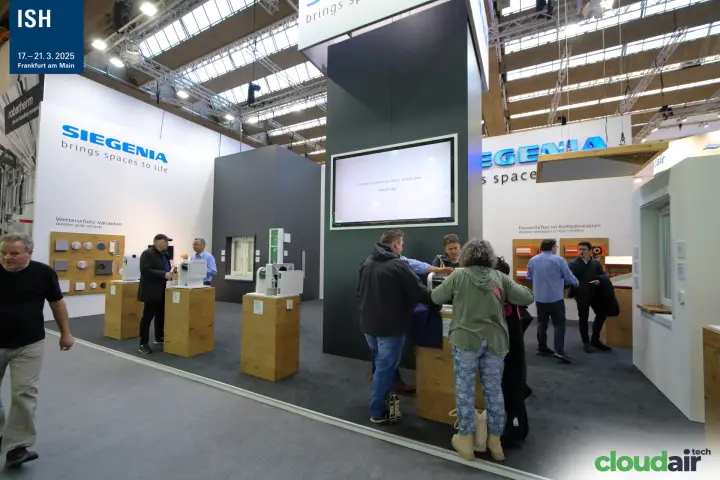 Siegenia stand with wall ventilators on wooden plinths at ISH 2025