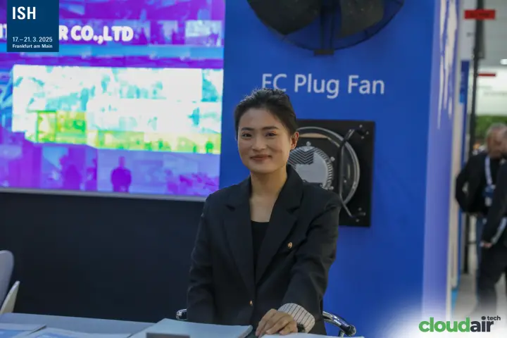 Staff member at the Bayoung counter in front of the EC Plug Fan display