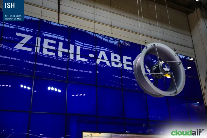 Suspended axial fan before large Ziehl-Abegg lettering at ISH 2025