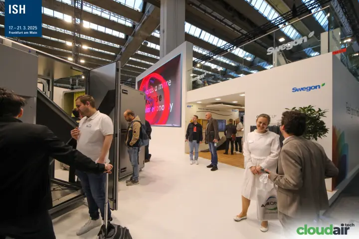 Swegon stand with an open AHU and a red video screen at ISH 2025