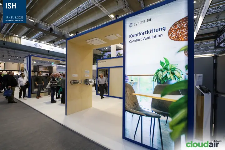 Systemair 'Komfortlüftung' display frame with duct components and ceiling diffuser at ISH 2025