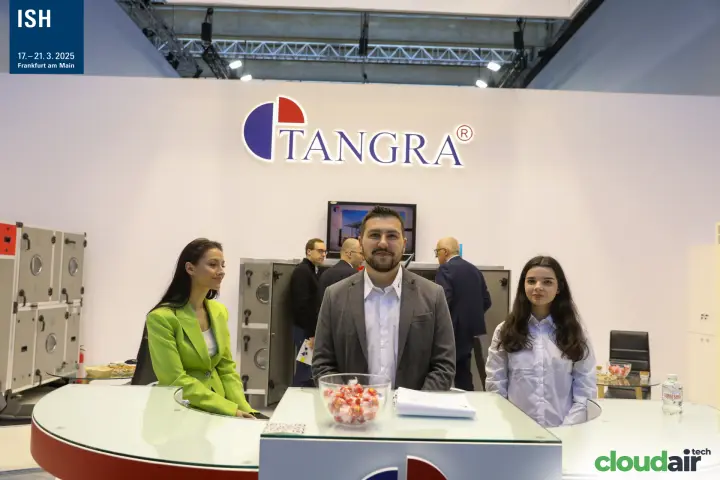 Tangra team at the reception desk with AHUs behind