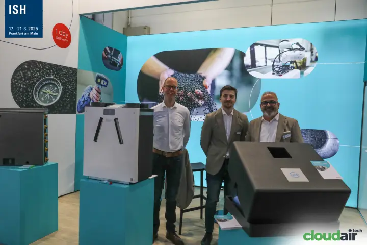 Team on a turquoise stand with EPP ventilation unit housings