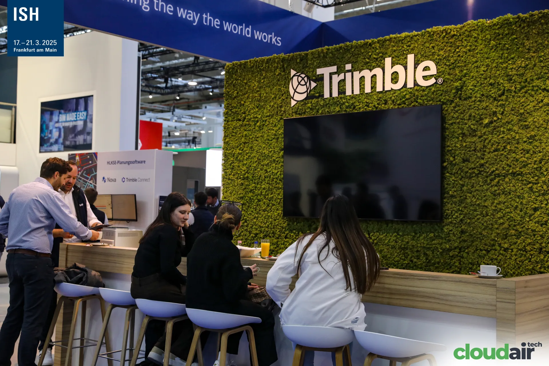Trimble moss wall with coffee bar and HLKSE software counter at ISH 2025