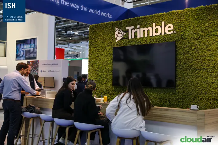 Trimble moss wall with coffee bar and HLKSE software counter at ISH 2025