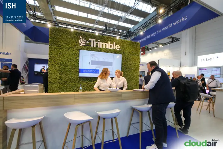 Trimble reception bar in front of the moss logo wall at ISH 2025