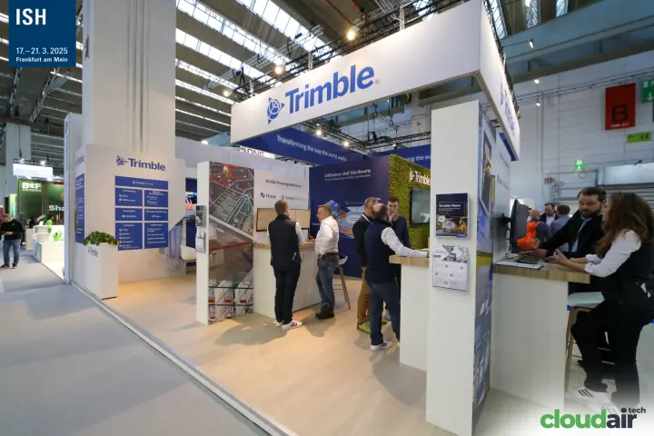 Trimble stand corner with product overview panel and Nova planning desk at ISH 2025
