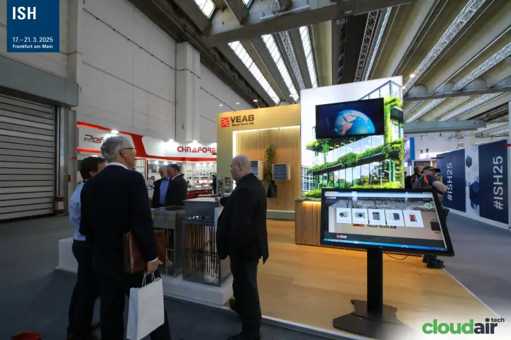 VEAB duct heaters with exposed elements beside a product touchscreen at ISH 2025