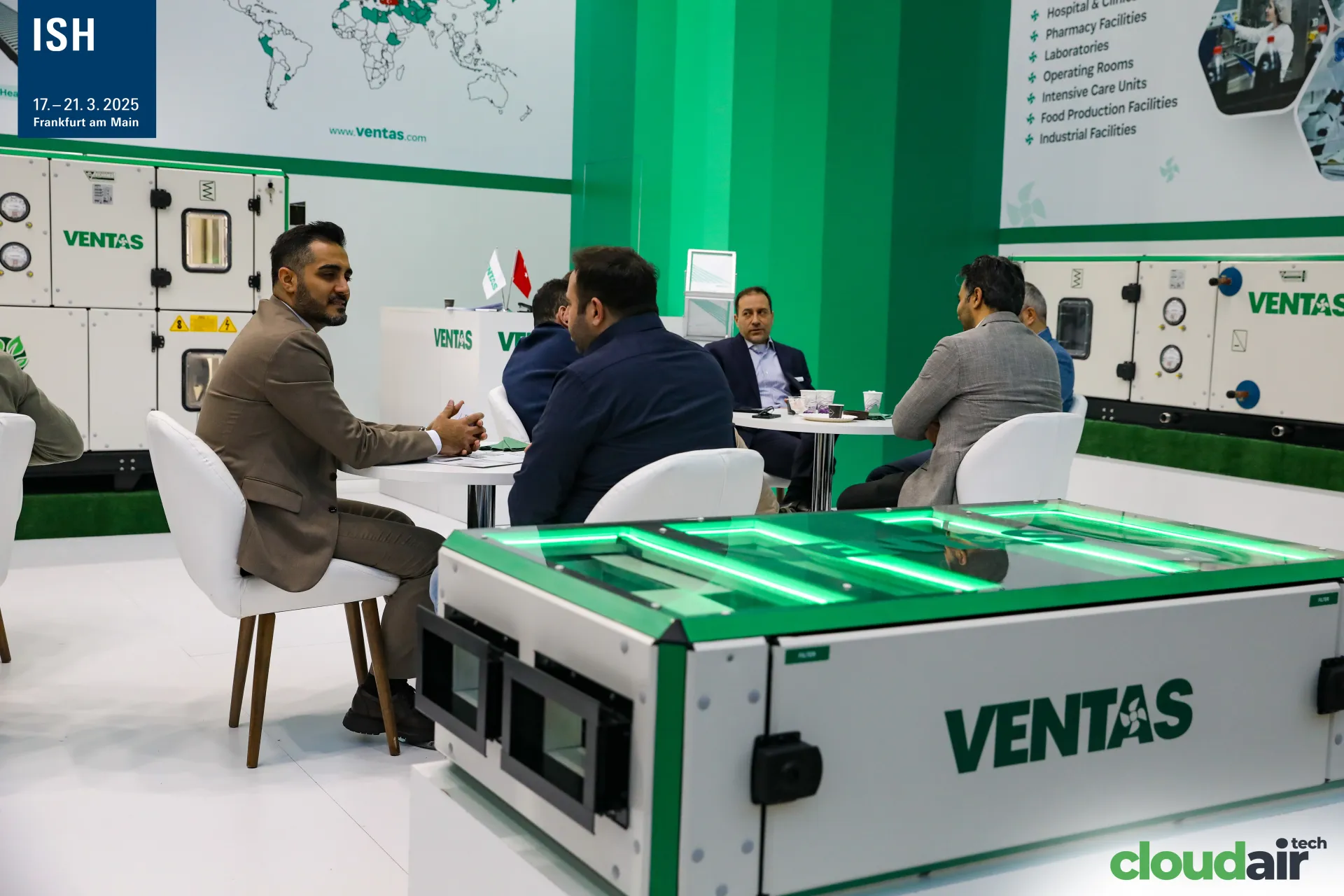 Ventas compact unit with green-lit top in front of the meeting area at ISH 2025