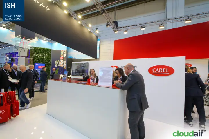 Visitor at the Carel reception counter beneath the red fascia at ISH 2025