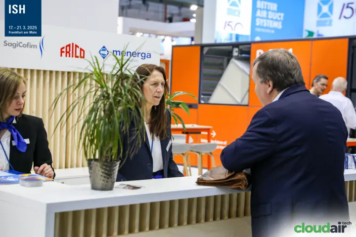 Visitor at the SagiCofim, Frico and Menerga counter, orange unit behind at ISH 2025