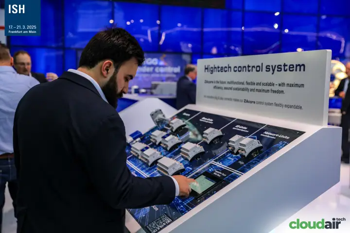Visitor trying the ZAcore control system touch panel at ISH 2025