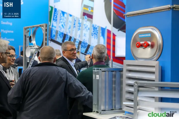 Visitors at Airworker stand with inspection door, dampers and louvre