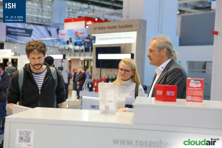 Visitors in conversation at the Rosenberg product counter
