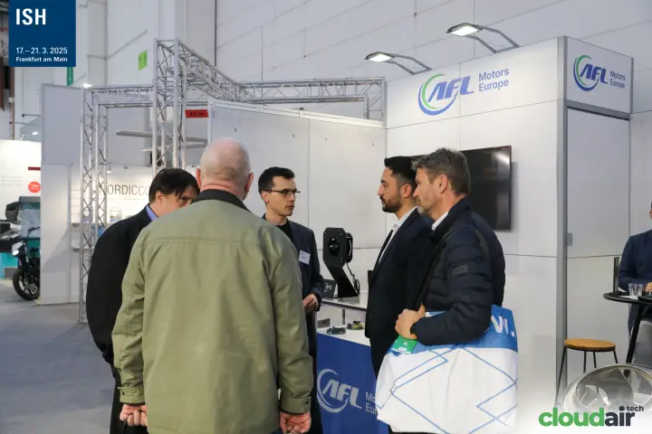 Visitors in discussion at the AFL Motors Europe corner stand at ISH 2025