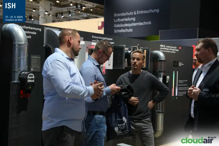 Visitors in front of Wildeboer smoke extraction damper wall at ISH 2025