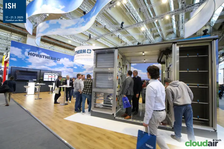 Visitors inspect the open Howatherm air handling unit