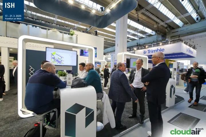 Visitors at a Linear frame booth with a BIM duct model on screen at ISH 2025