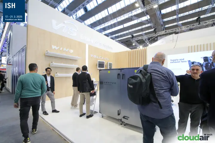 Visitors at the VTS stand beside WING and VOLCANO product wall at ISH 2025