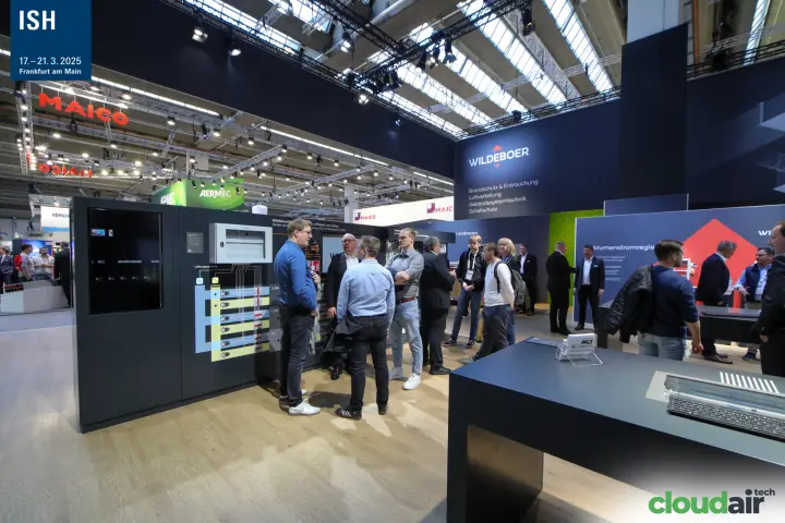 Visitors at the Wildeboer building systems display with ventilation schematic at ISH 2025