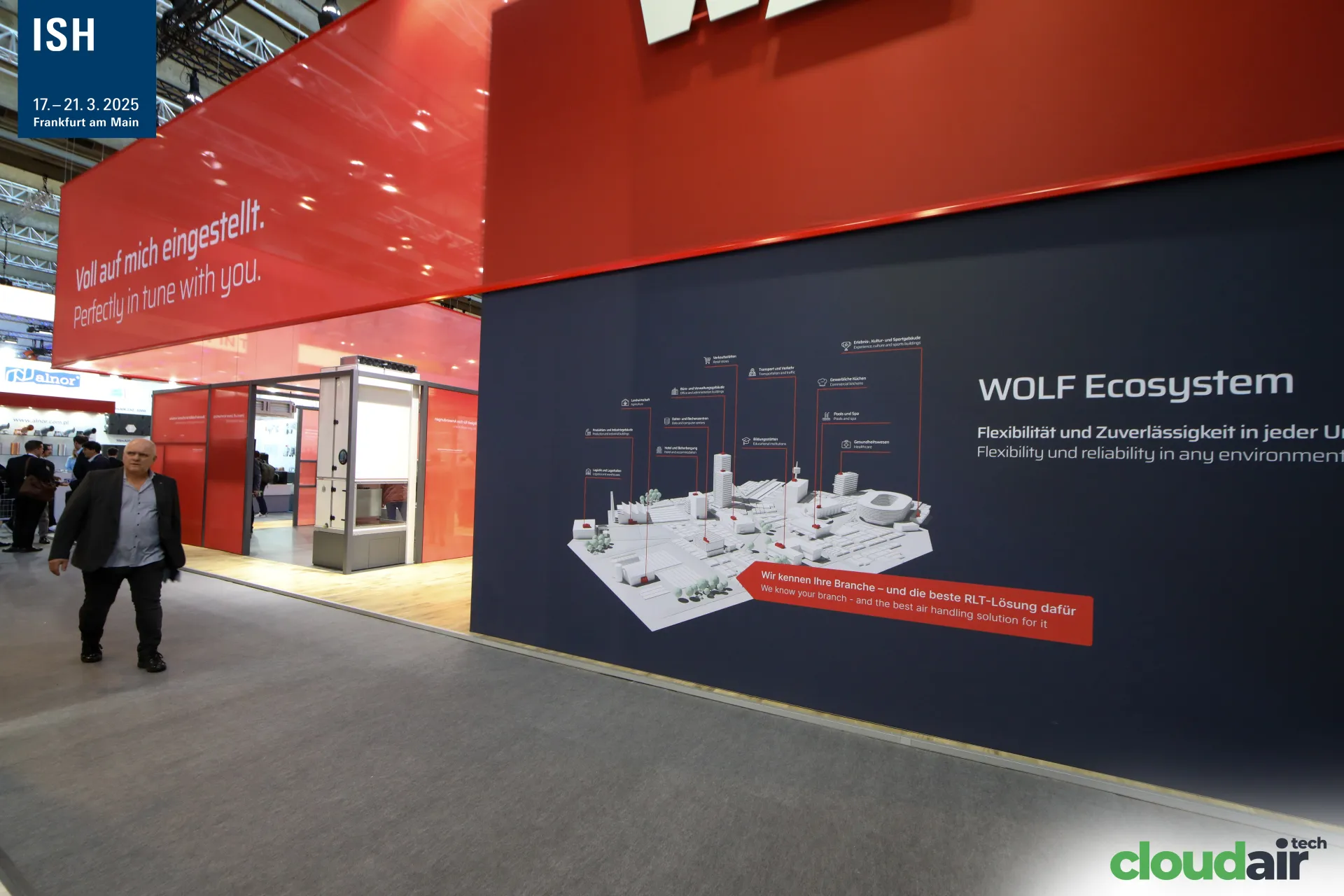 "Voll auf mich eingestellt" fascia and RLT graphic on the WOLF stand at ISH 2025