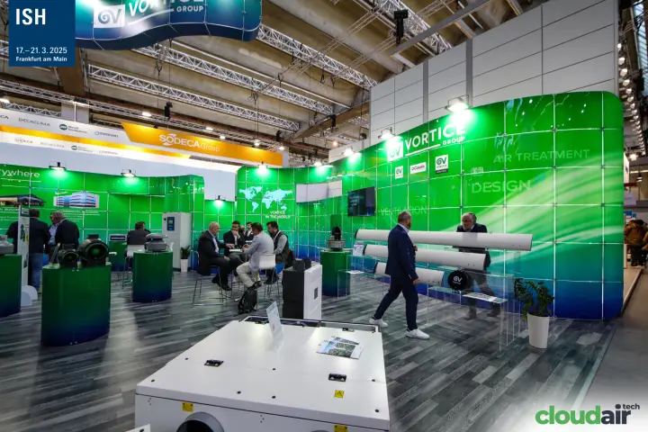 Vortice Group stand with green glass walls and large fan blades at ISH 2025