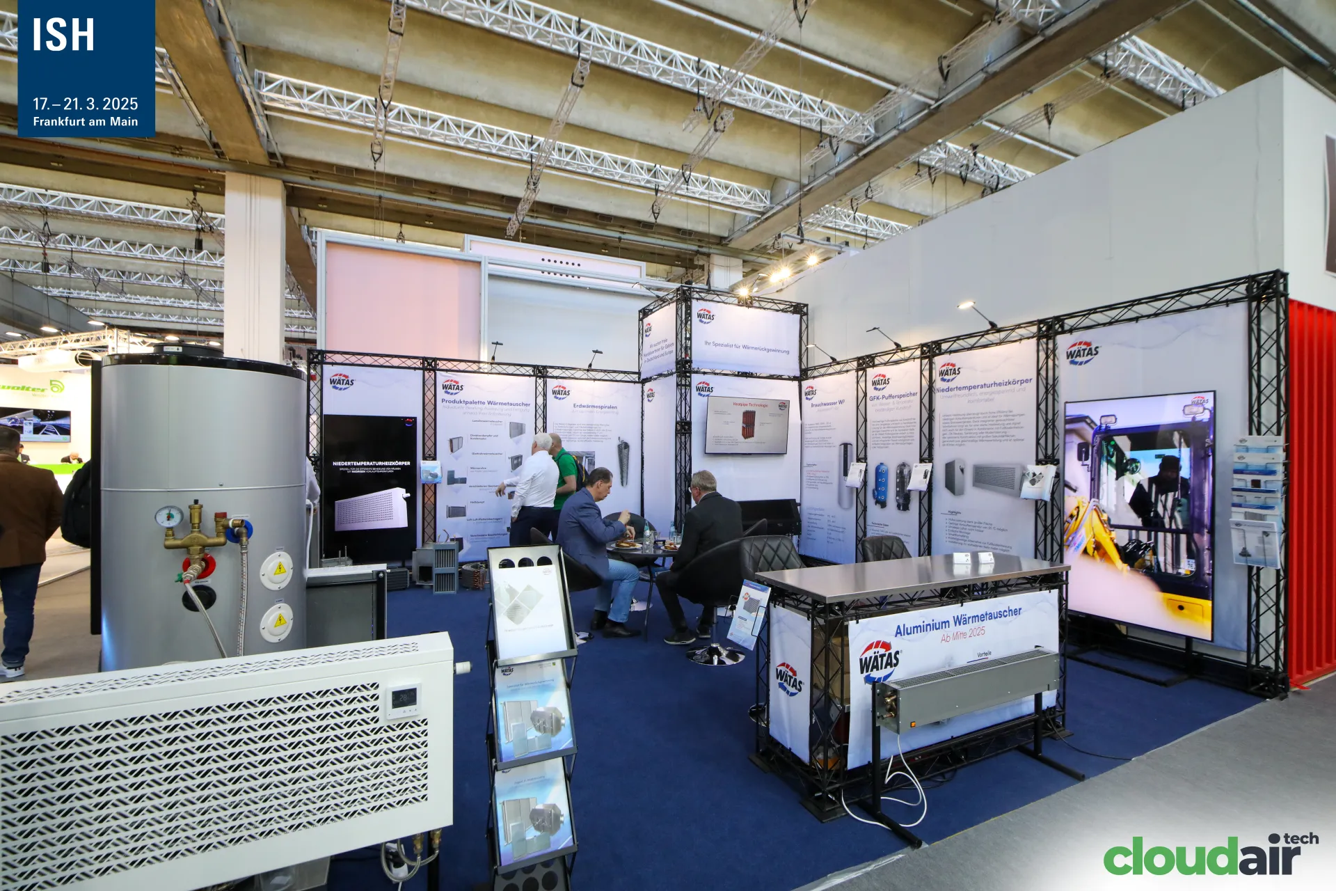 Wätas stand with heat exchangers, buffer tanks and radiators at ISH 2025