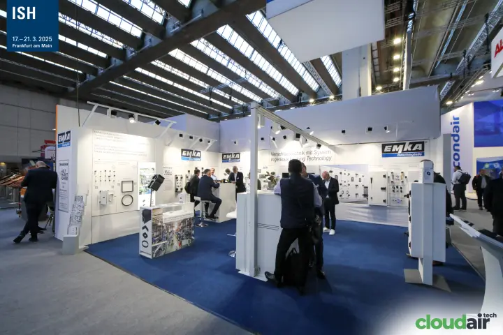 Wide view of the white EMKA Beschlagteile stand on blue carpet