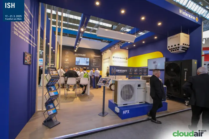 Winterwarm stand with HPX heat pump and Qwikshift hybrid heater banner at ISH 2025