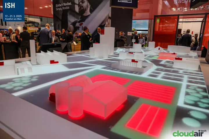 Wolf interactive city model with red-lit industrial buildings at ISH 2025