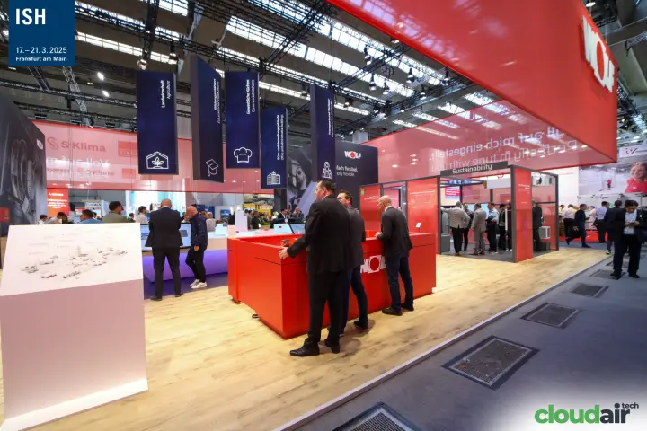 Wolf red counter beneath hanging application-sector banners at ISH 2025