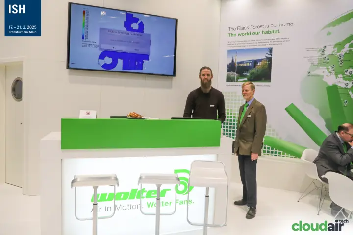 Wolter reception with backlit logo and flow simulation screen at ISH 2025
