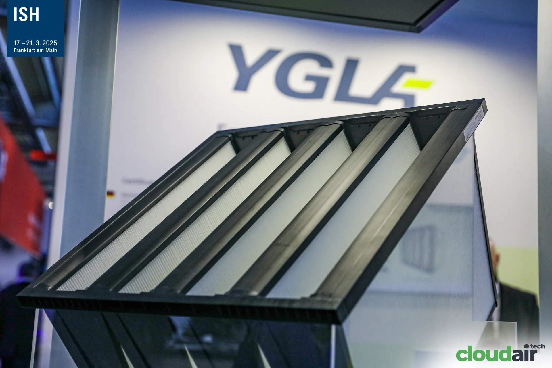 YGLA compact V-bank air filter shown in front of the YGLA logo at ISH 2025