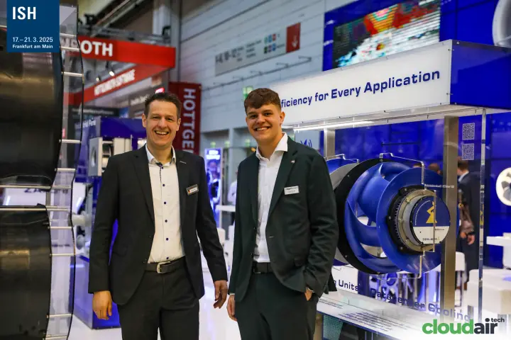 Ziehl-Abegg staff beside an ECblue centrifugal fan display