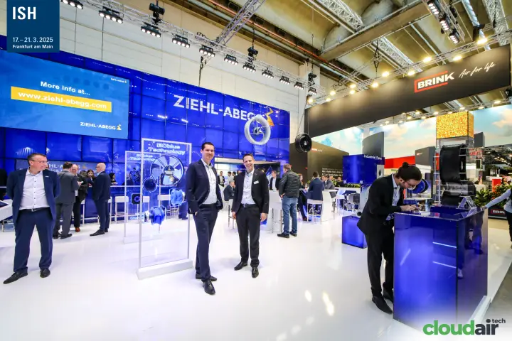 Ziehl-Abegg staff by the ECblue Technology fan panel at ISH 2025